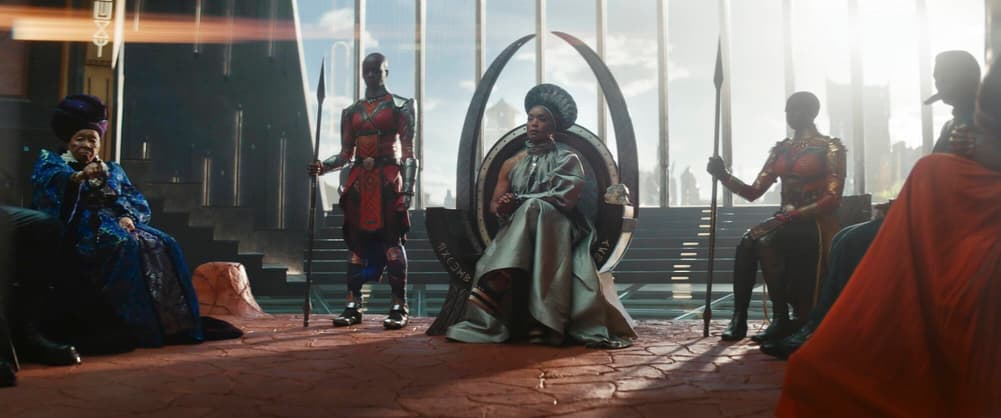 Queen Ramonda flanked by Dora Milaje warriors in Marvel Studios' 'Black Panther: Wakanda Forever'