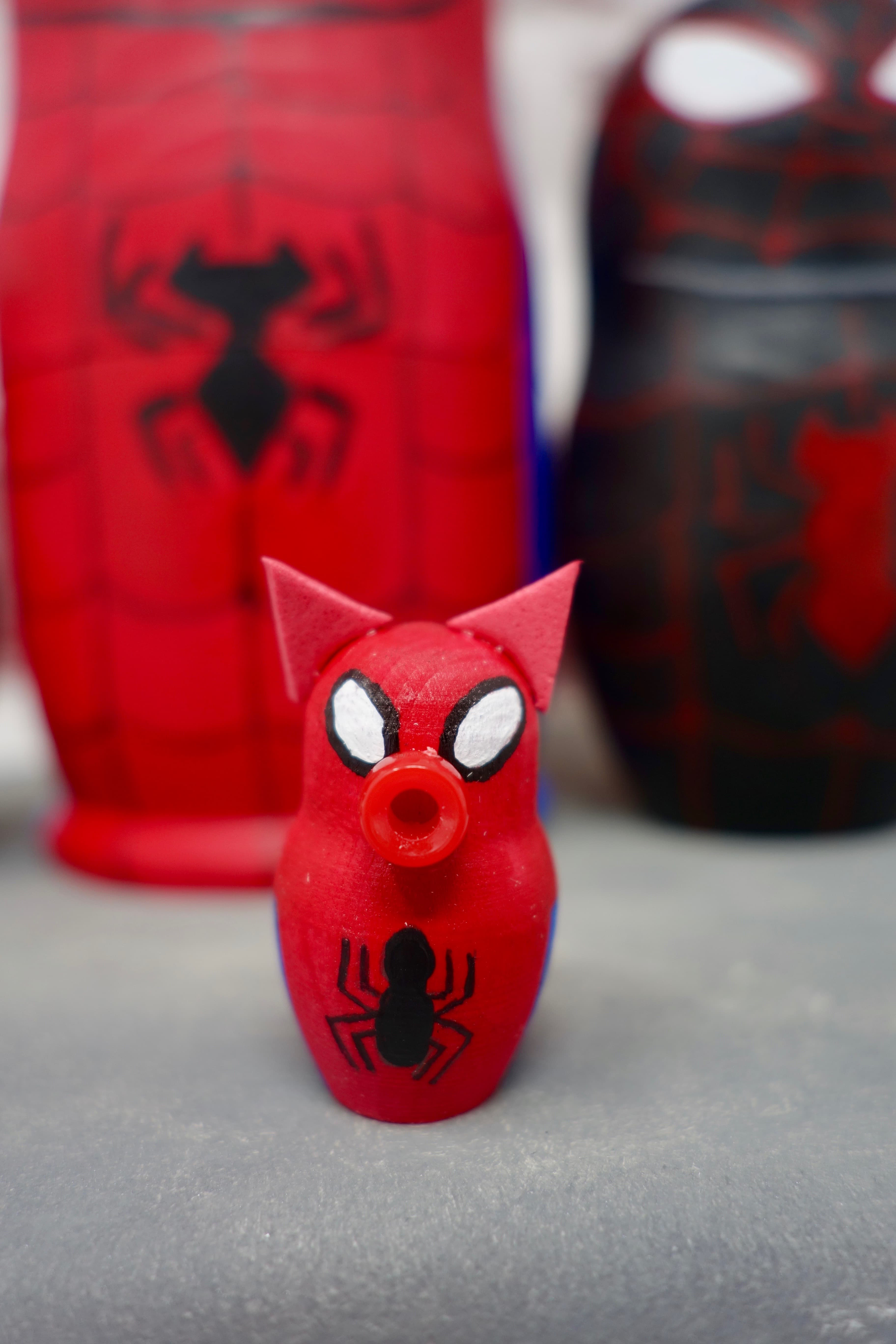 Spider-Geddon Nesting Dolls: Cut two tiny triangles with a rounded bottom edge for Spider-Ham